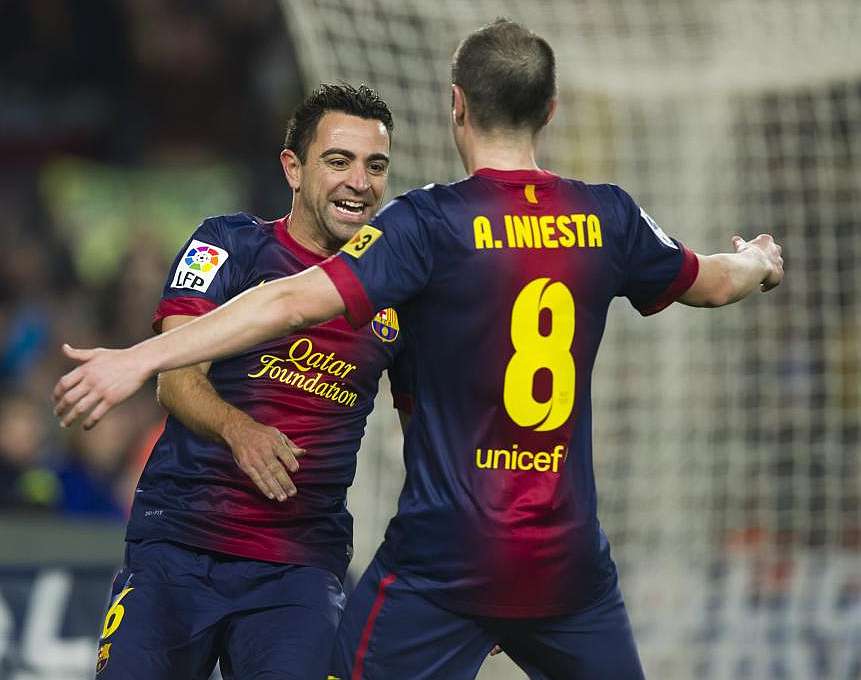 Iniesta e Xavi foram top 3 da Bola de Ouro